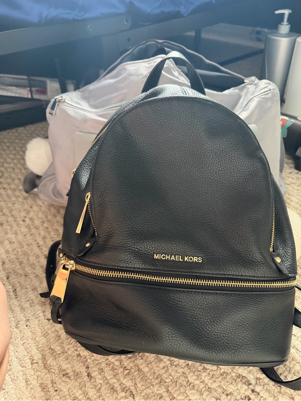 Michael Kors Black Leather Backpack with Gold-Tone Accents